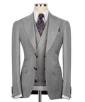 Grey check three-piece suit: suit jacket, waistcoat, patterned tie and pocket square