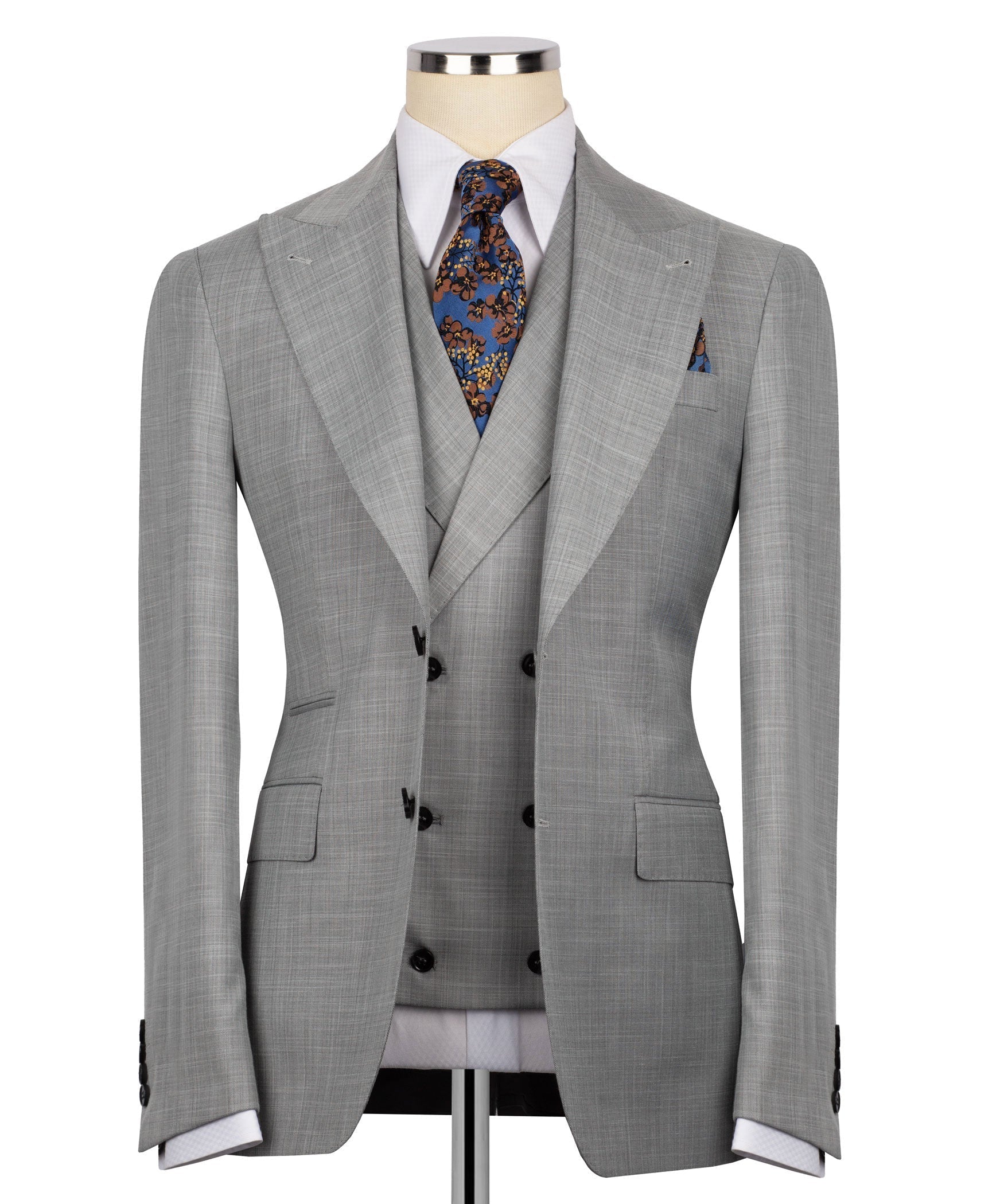 Grey check three-piece suit: suit jacket, waistcoat, patterned tie and pocket square