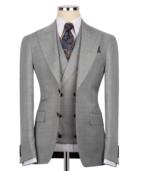 Grey check three-piece suit: suit jacket, waistcoat, patterned tie and pocket square