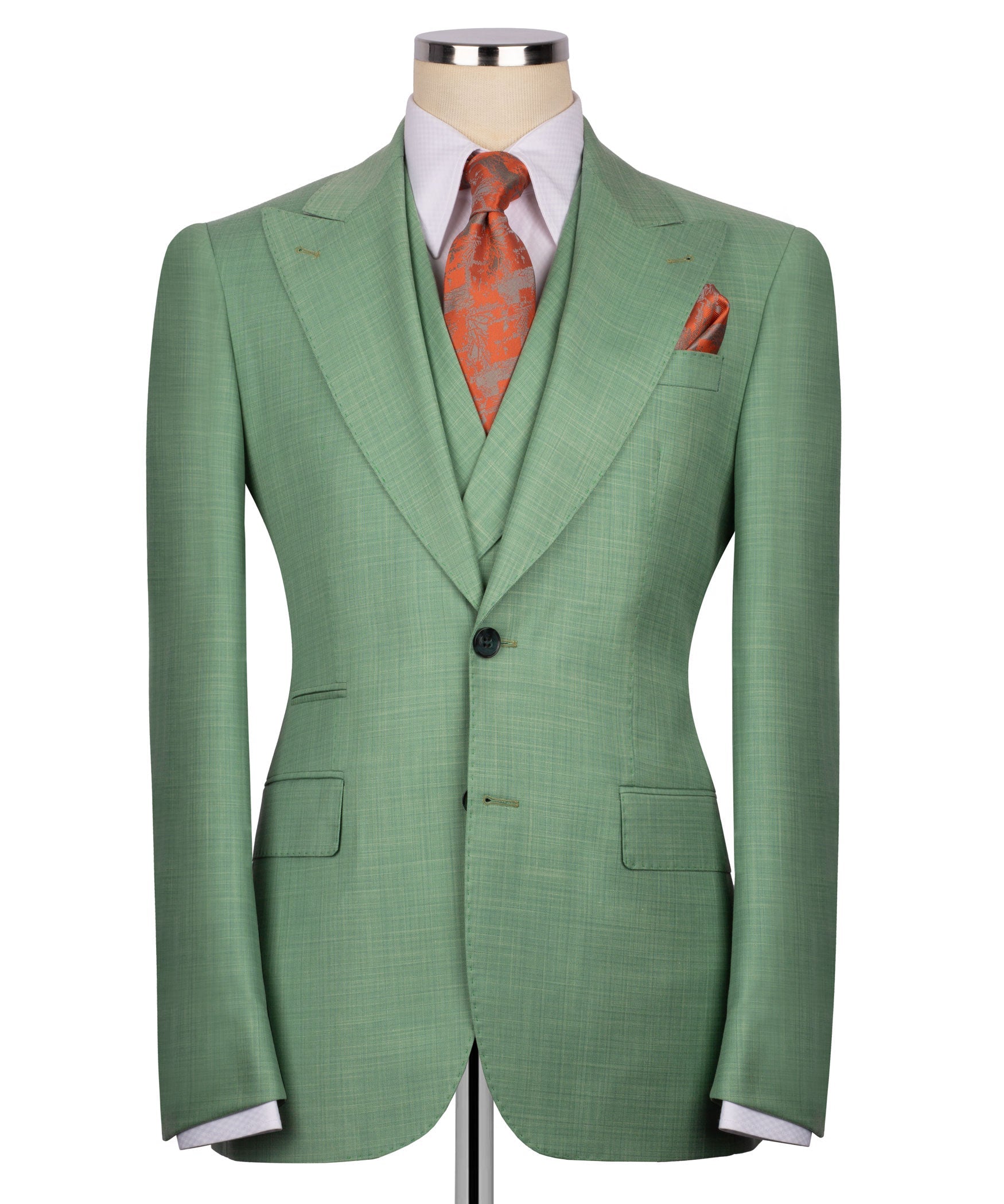 Back view of green suit jacket with single vent; orange patterned tie