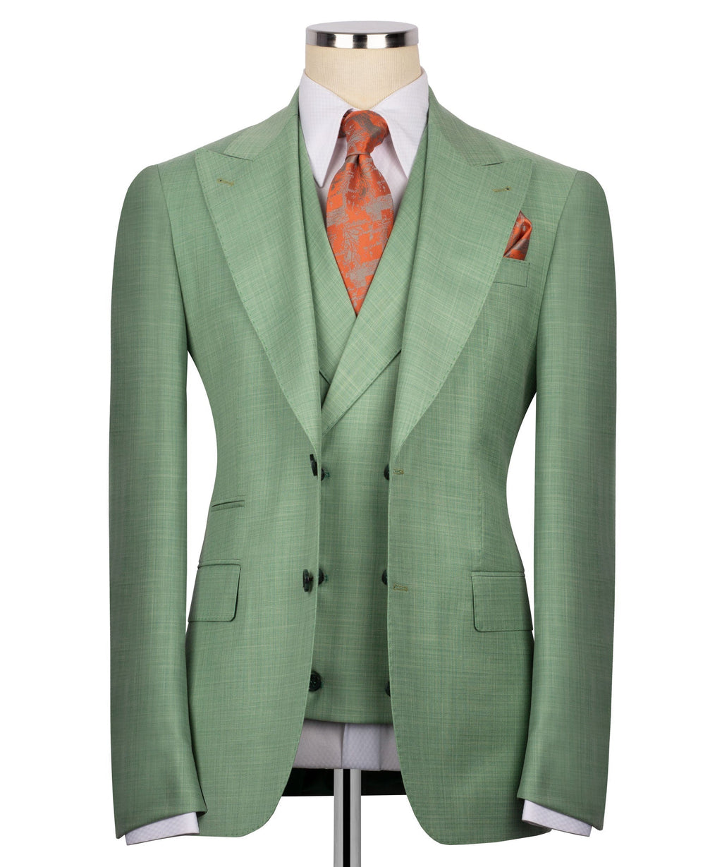 Green suit jacket with notch lapels, matching vest, and orange patterned tie