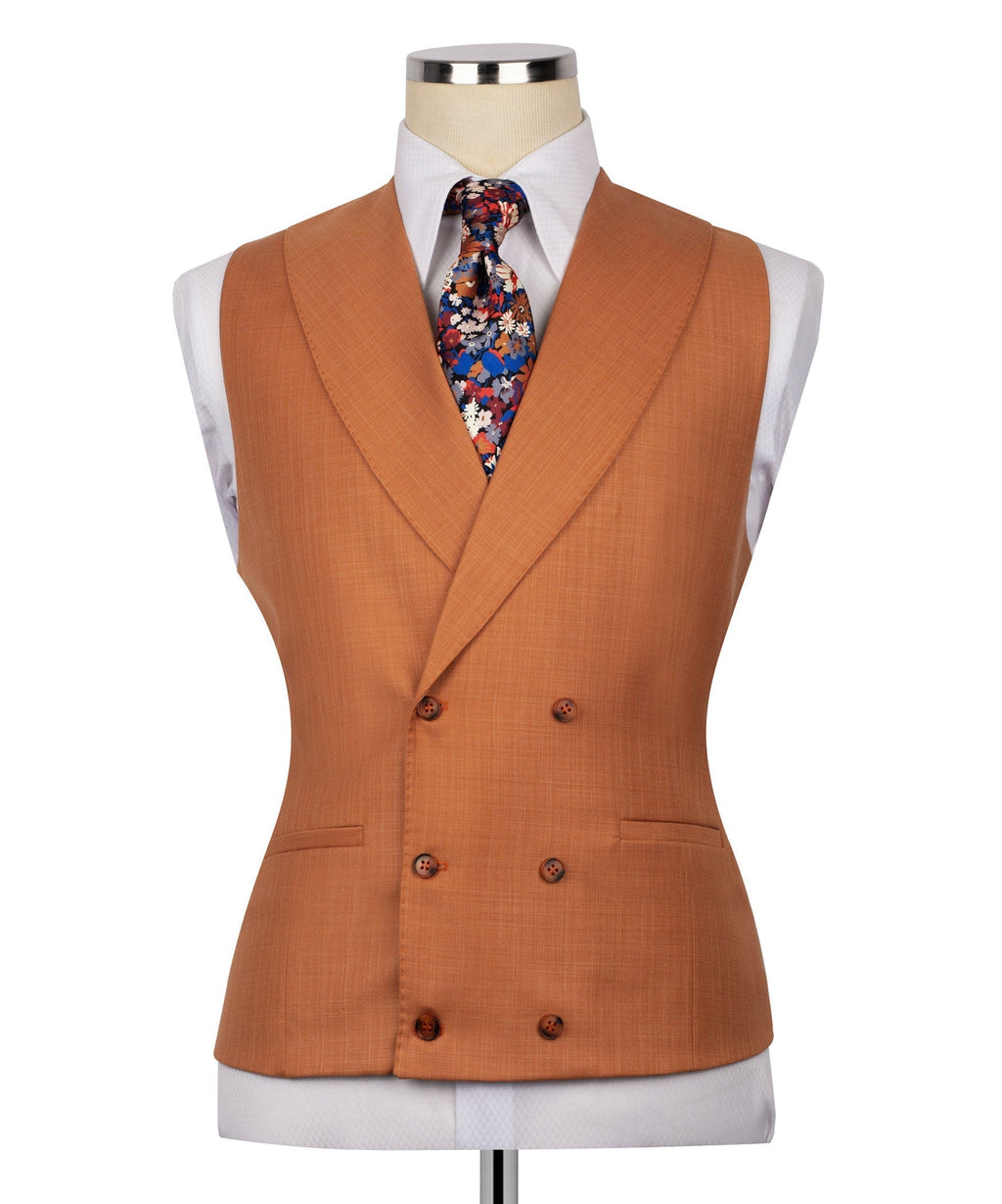 Rust-orange vest with double-breasted buttons, floral tie, and suit jacket lapels