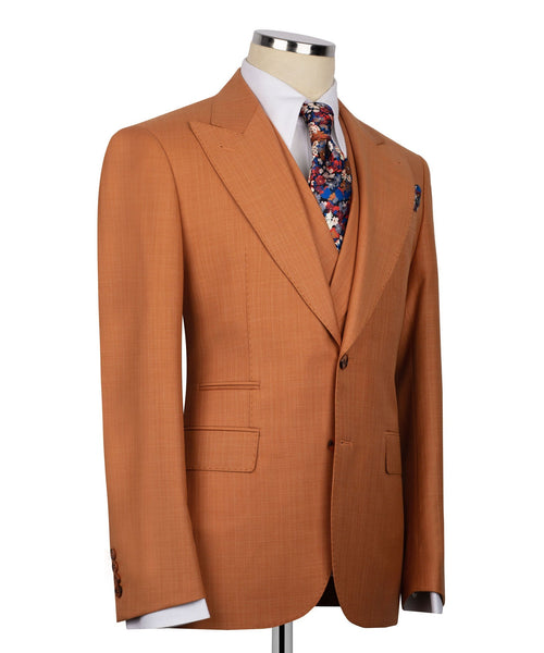 Rust-orange suit jacket with flap pockets, matching vest, and floral pocket square