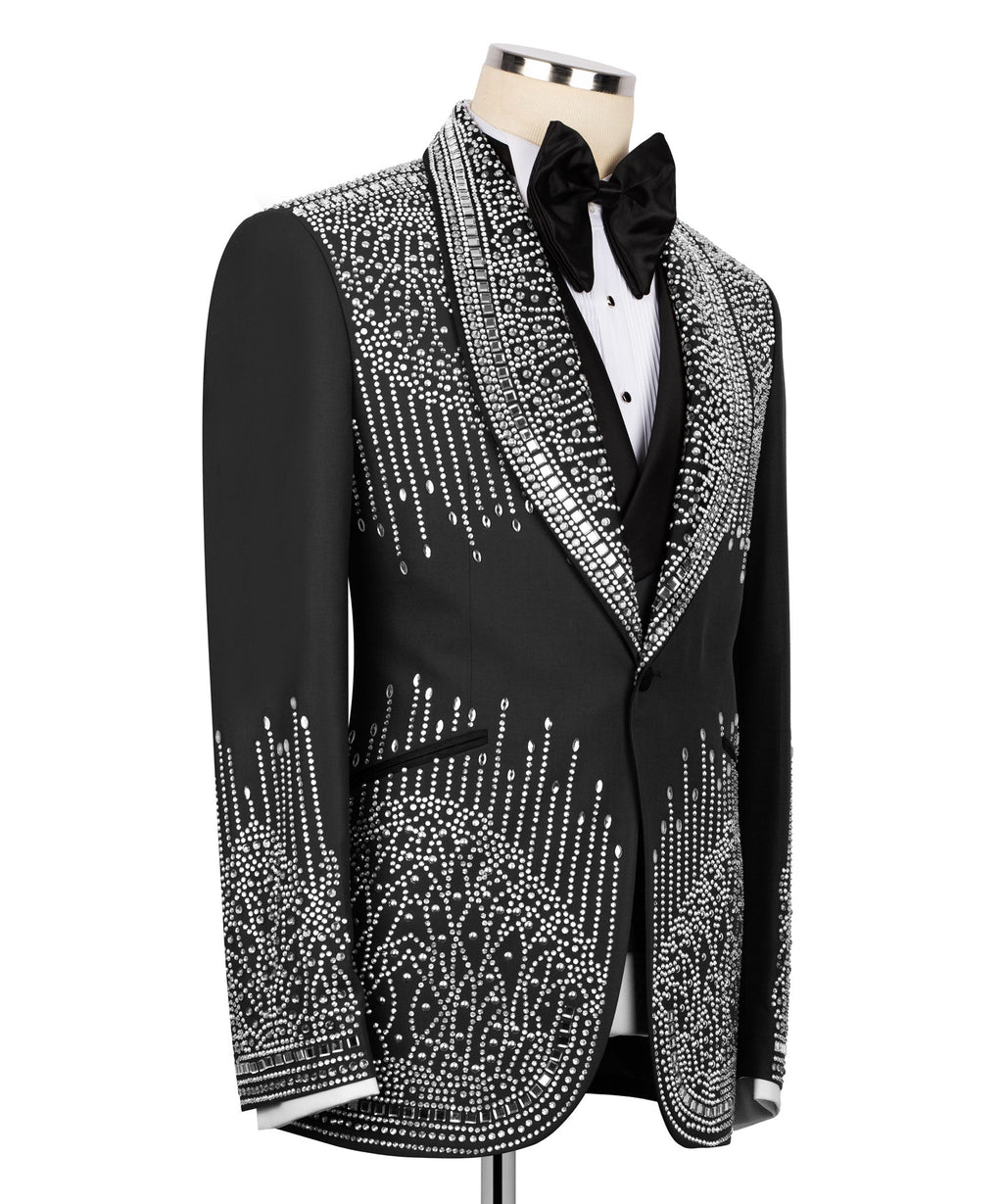 Black tuxedo jacket with silver rhinestone lapel trim and bow tie, white shirt front