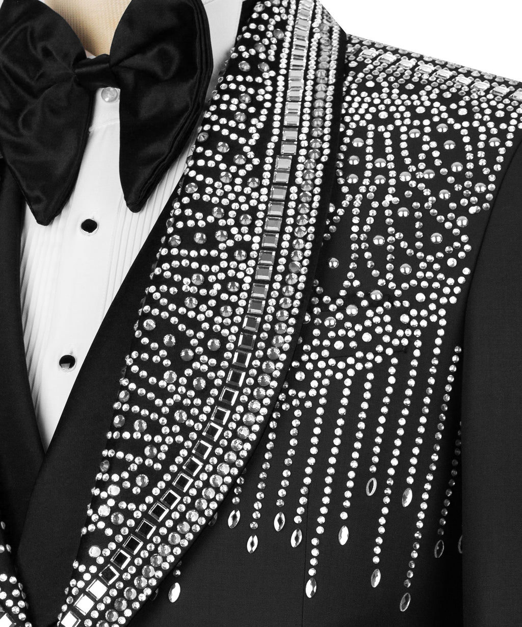 Close-up tuxedo lapel with silver rhinestone rows and black satin bow tie