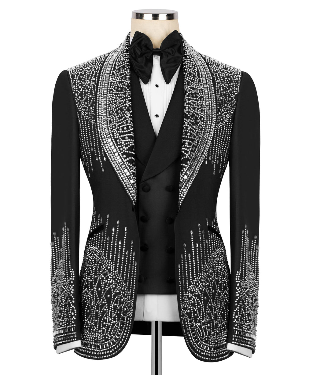 Black tuxedo jacket with silver rhinestone embroidery, black bow tie, white shirt