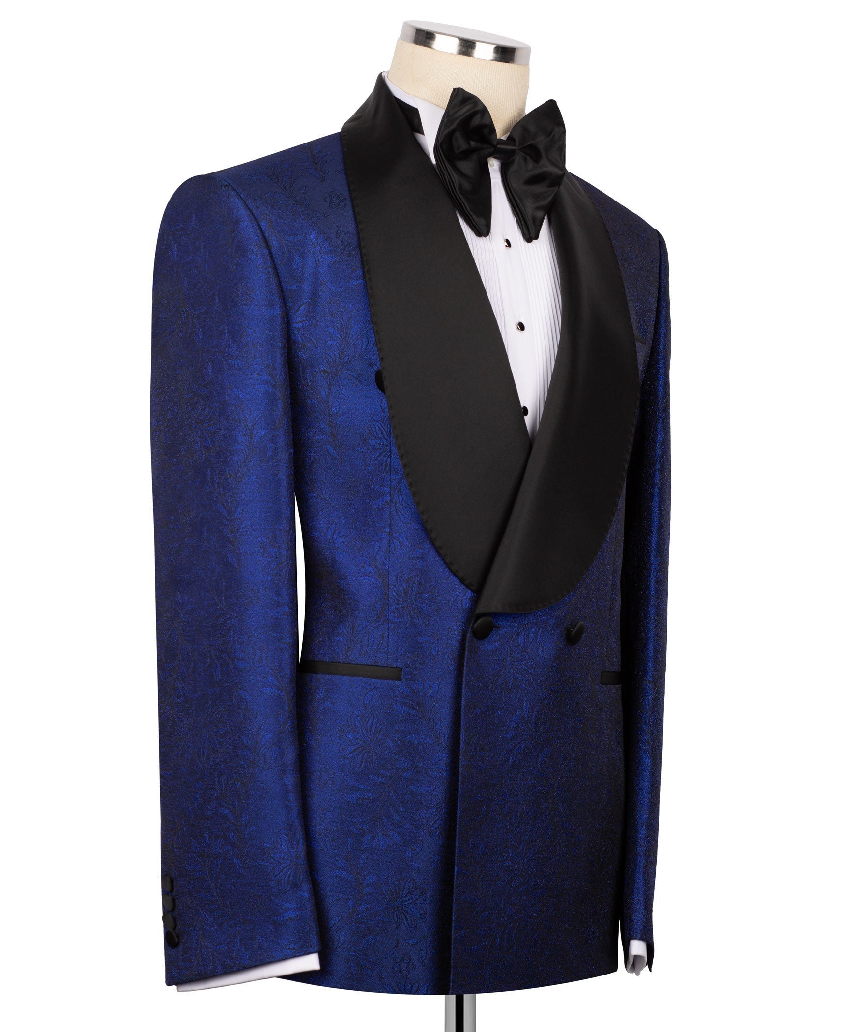 Blue tuxedo suit with satin-look lapels, black bow tie, and double-breasted vest
