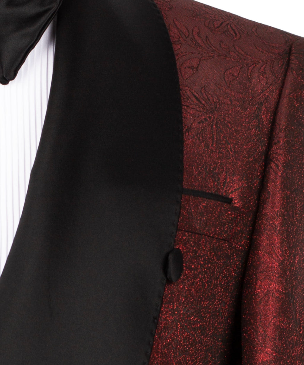 Close-up of black tuxedo lapel and red patterned jacket panel