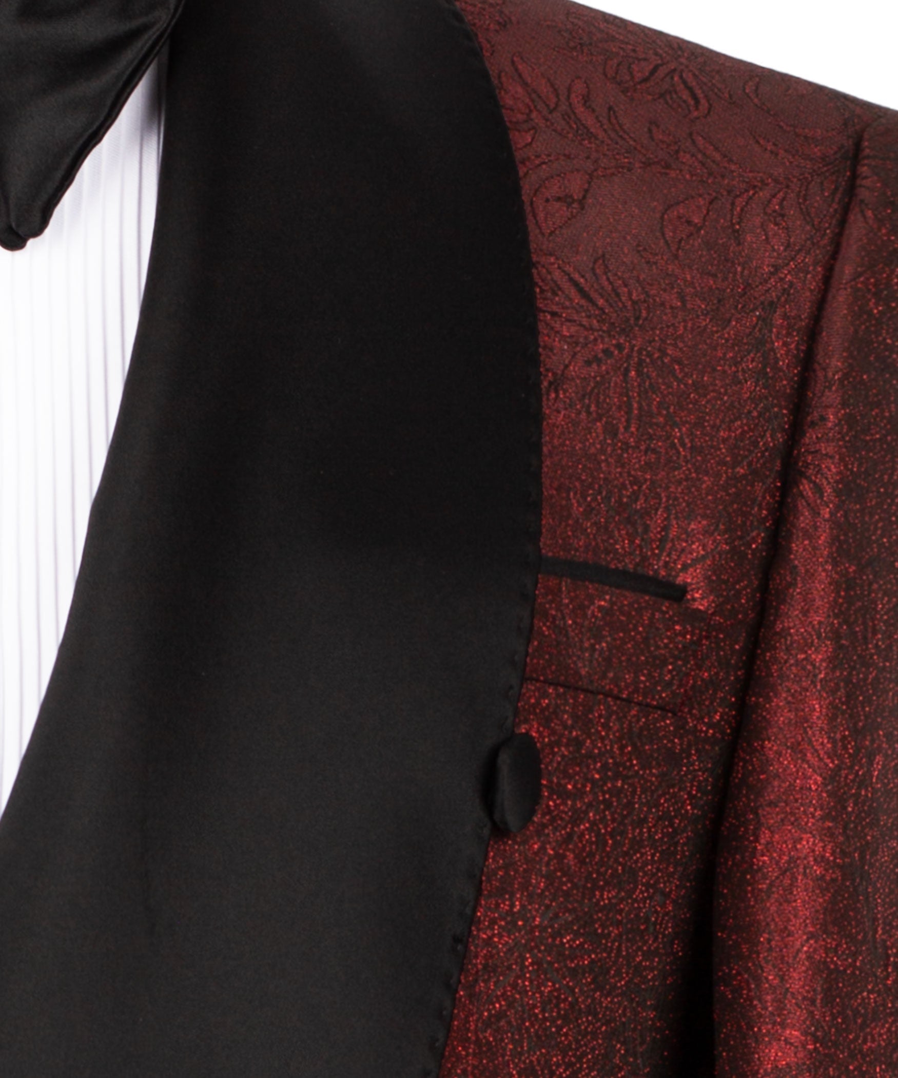 Close-up of black tuxedo lapel and red patterned jacket panel