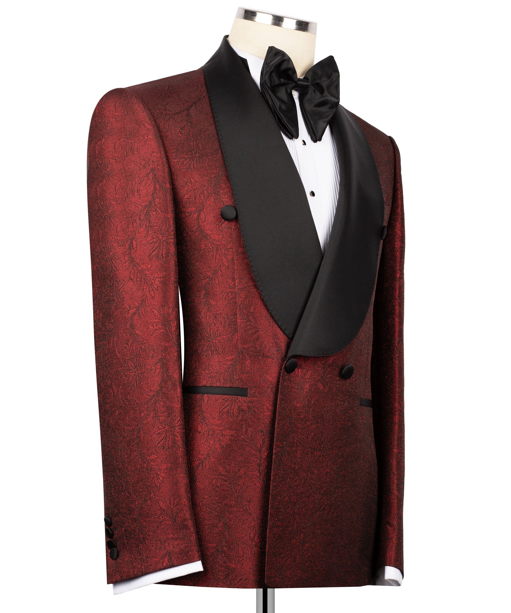 Red textured tuxedo jacket on mannequin, black waistcoat and bow tie