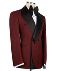 Burgundy tuxedo suit with black vest, satin trim, and self-tie bow