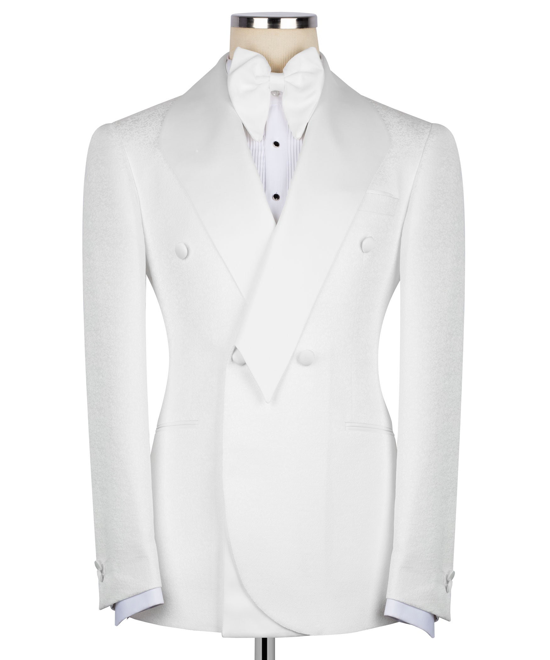 White tuxedo jacket with geometric bow tie, pointed lapels, and matching vest