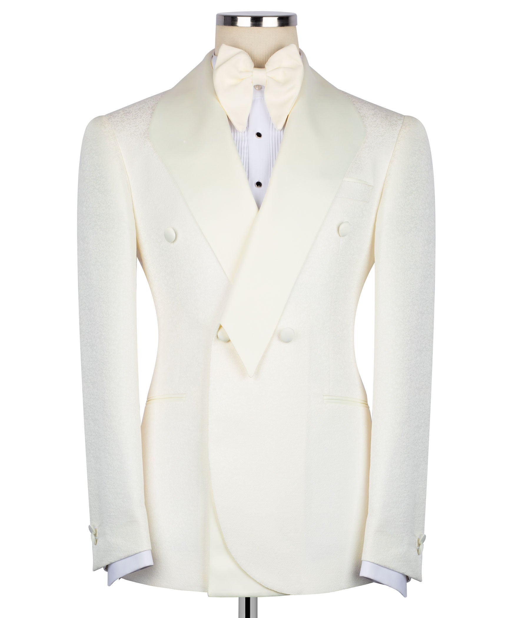 Cream tuxedo two-piece set: fitted jacket with vest, bow tie, and light blue shirt