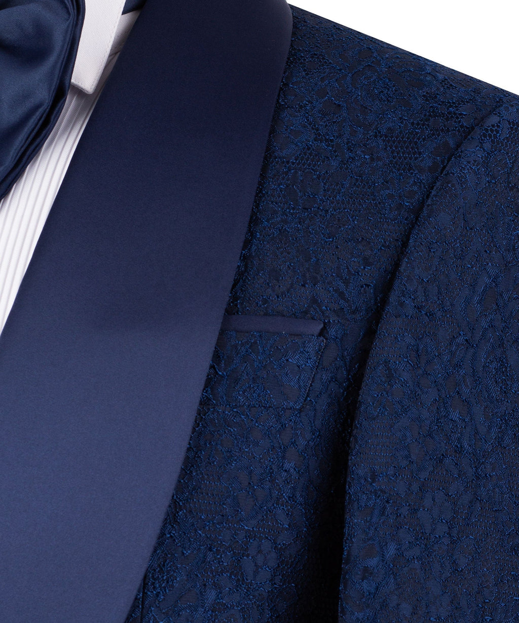 Navy textured tuxedo fabric detail on suit jacket panels near the vest