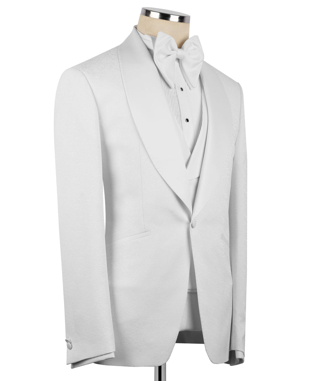White tuxedo jacket side view with bow tie and ribbed button vest on a mannequin