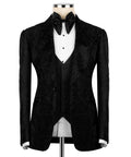 Black stone-embroidered tuxedo jacket with satin bow tie and waistcoat over white shirt
