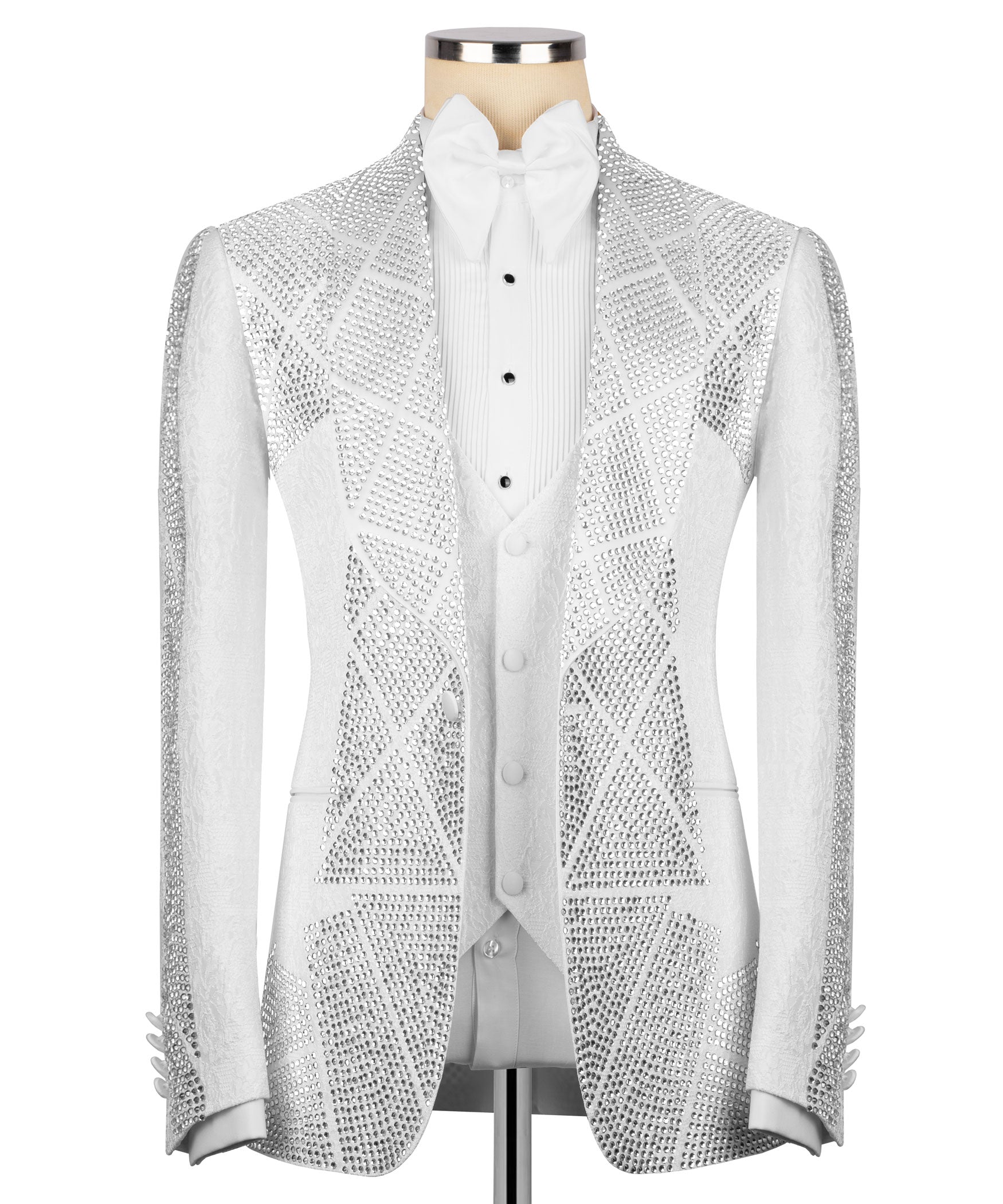 White tuxedo jacket with silver stone embroidery and peak lapels; white shirt front