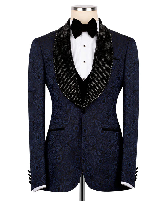Navy blue patterned tuxedo with black bow tie on a white background