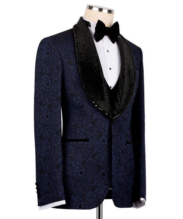 Navy blue tuxedo with decorative lapels on a mannequin against a white background