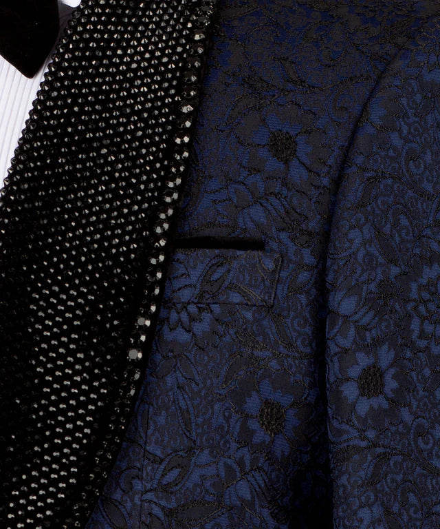 Close-up of a dark blue patterned jacket with a textured black lapel.