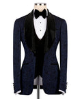 Navy blue patterned tuxedo with black bow tie on a mannequin against a white background