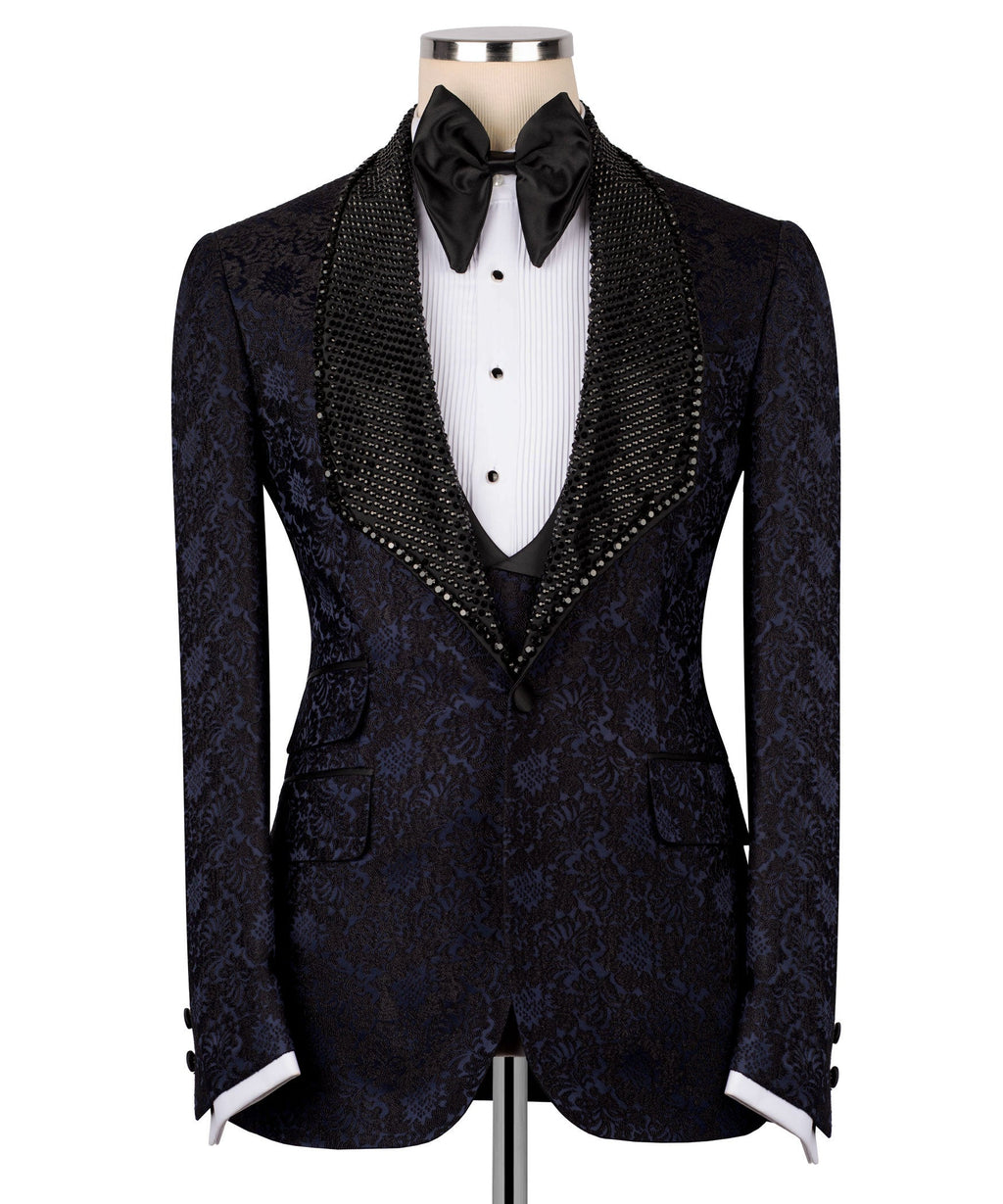 Navy tuxedo jacket with black sequined trim, bow tie, and matching waistcoat