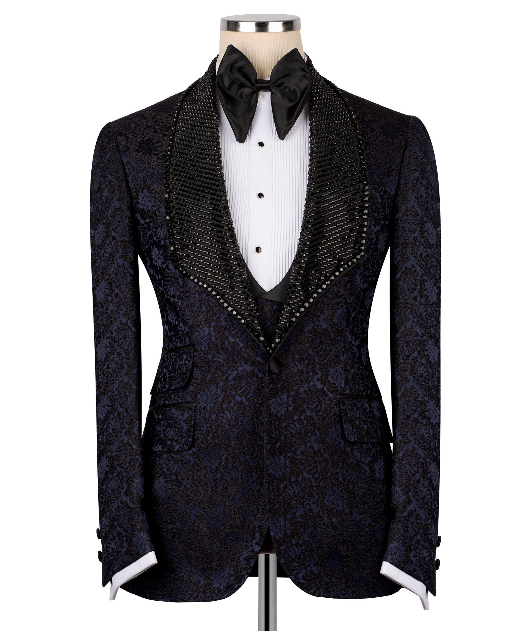 Navy tuxedo jacket with black sequined trim, bow tie, and matching waistcoat