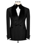 Black velvet-collar tuxedo jacket with satin lapels, bow tie and vest, front view
