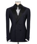 Navy tuxedo jacket with black satin shawl collar and bow tie, six-button front