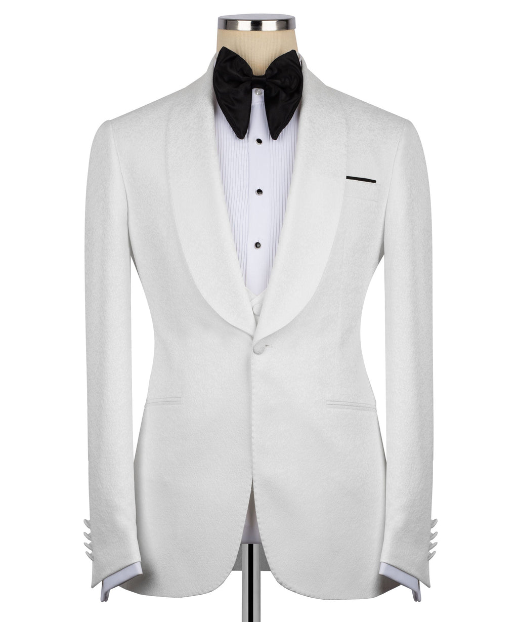 White tuxedo jacket front view with black bow tie over white vest buttons