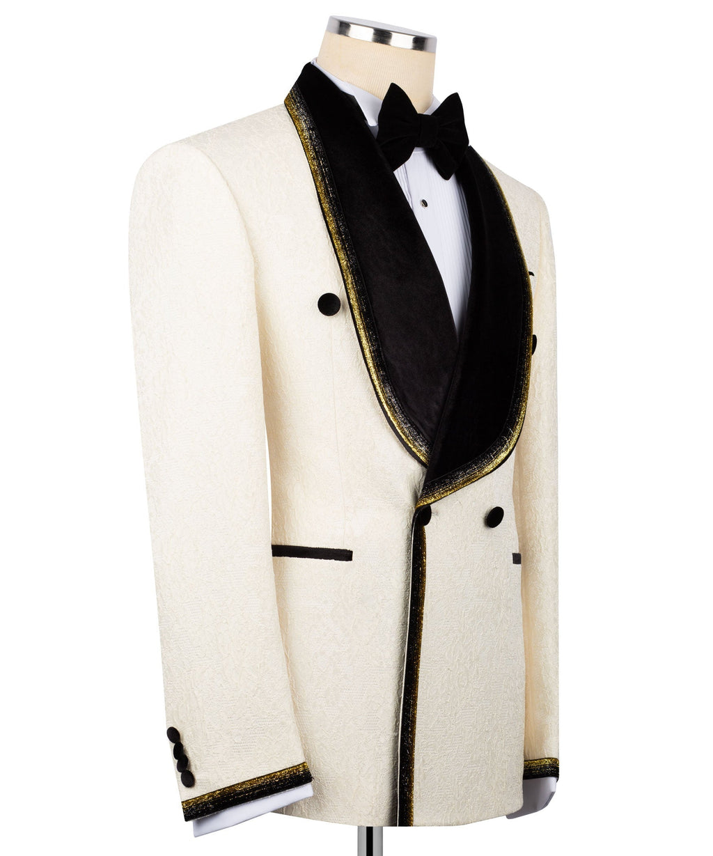 Ivory tuxedo jacket side view with black velvet collar, gold-embroidered trim and buttons