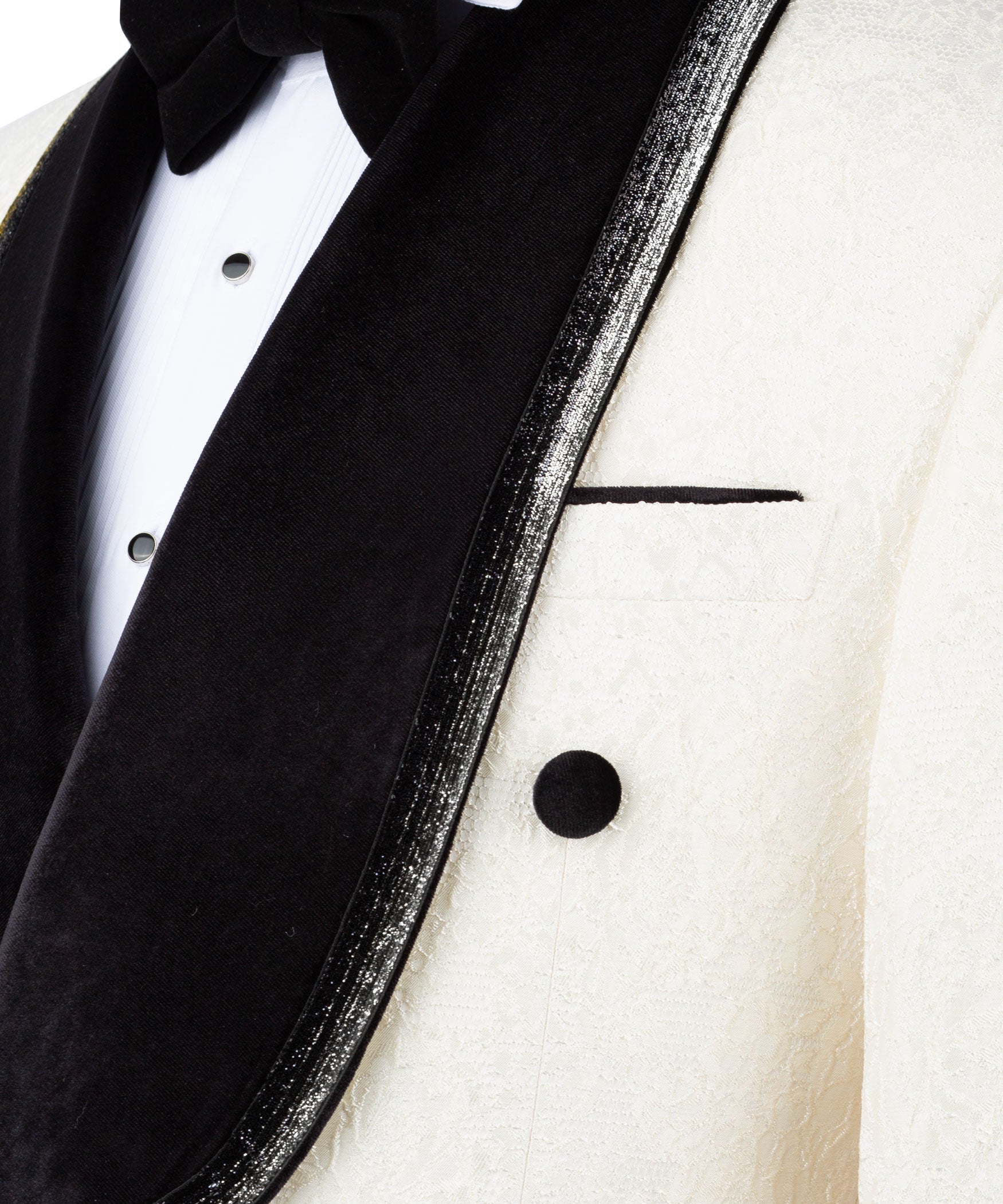 Close-up of black velvet shawl collar with silver-toned edge trim and ivory lapel