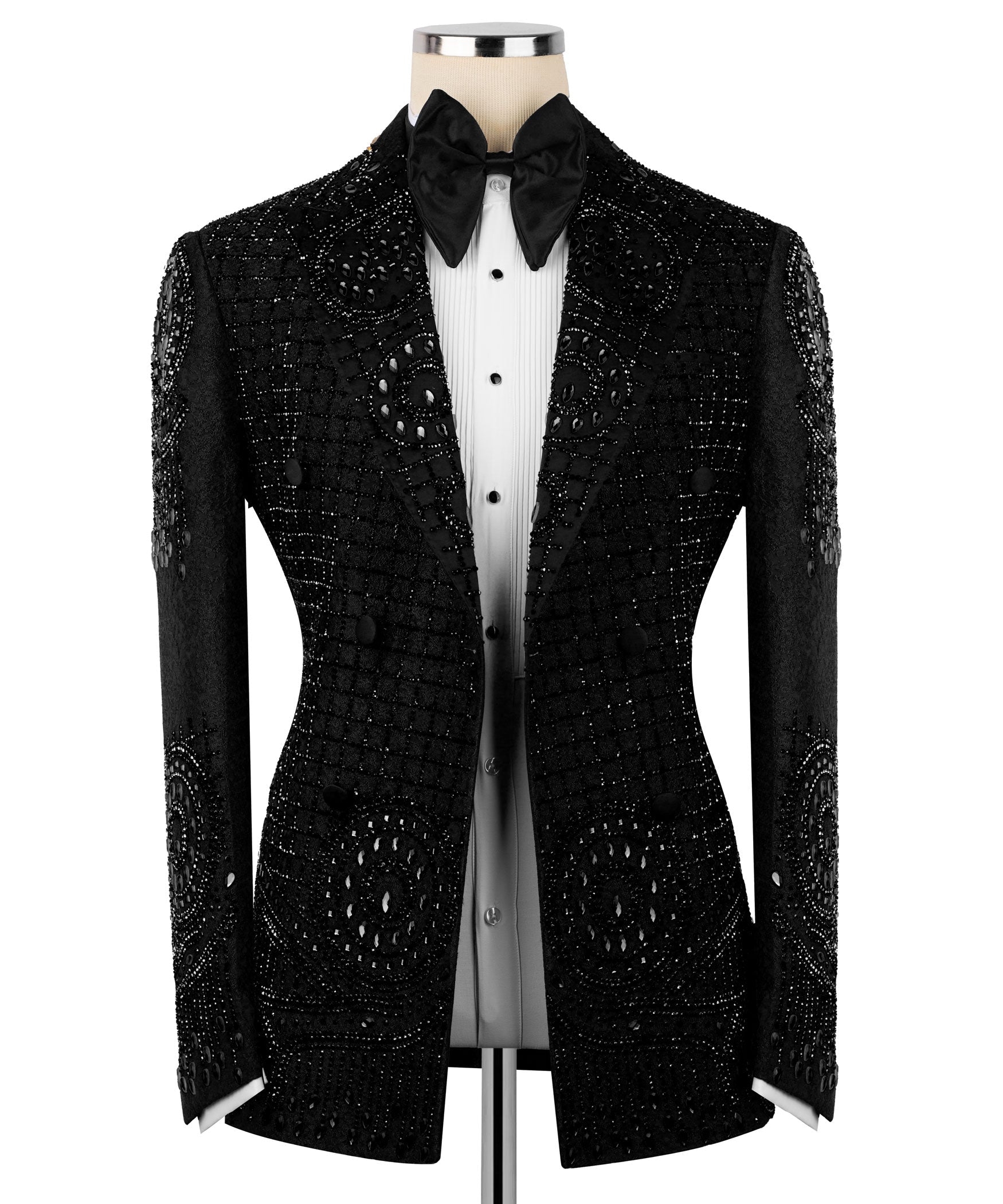 Black tuxedo jacket front with embroidered panels, peaked lapels, and bow tie