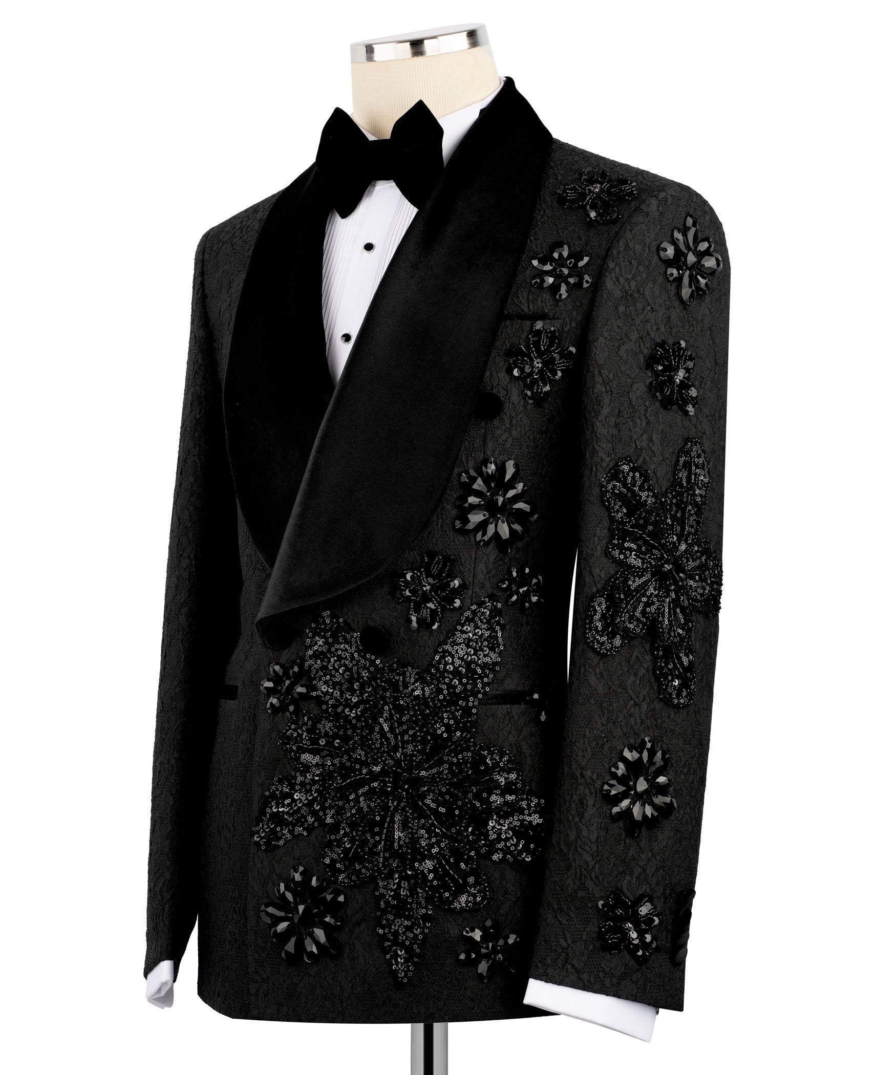 Black tuxedo two-piece suit with satin bow tie; embroidered lapels and blazer front