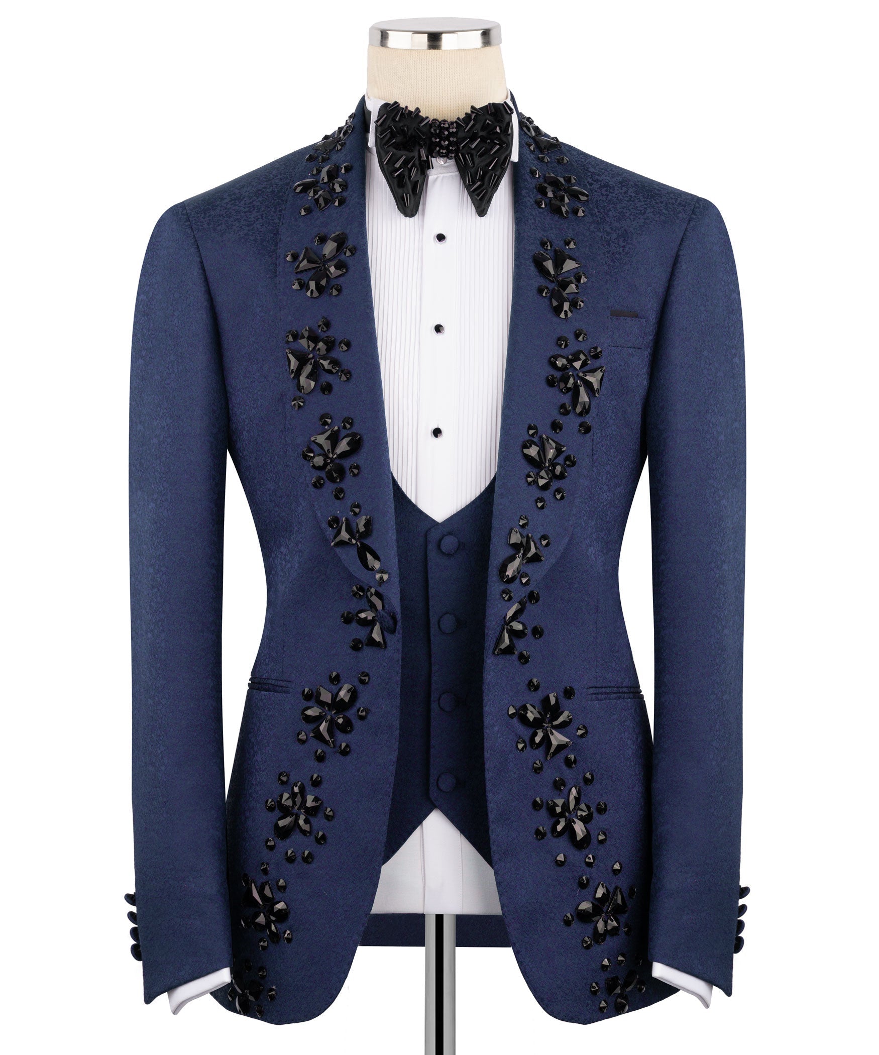 Hand-embroidered navy tuxedo jacket with black jeweled floral trim, white shirt and vest