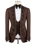 Brown tuxedo jacket with black floral bead embroidery; white shirt and waistcoat