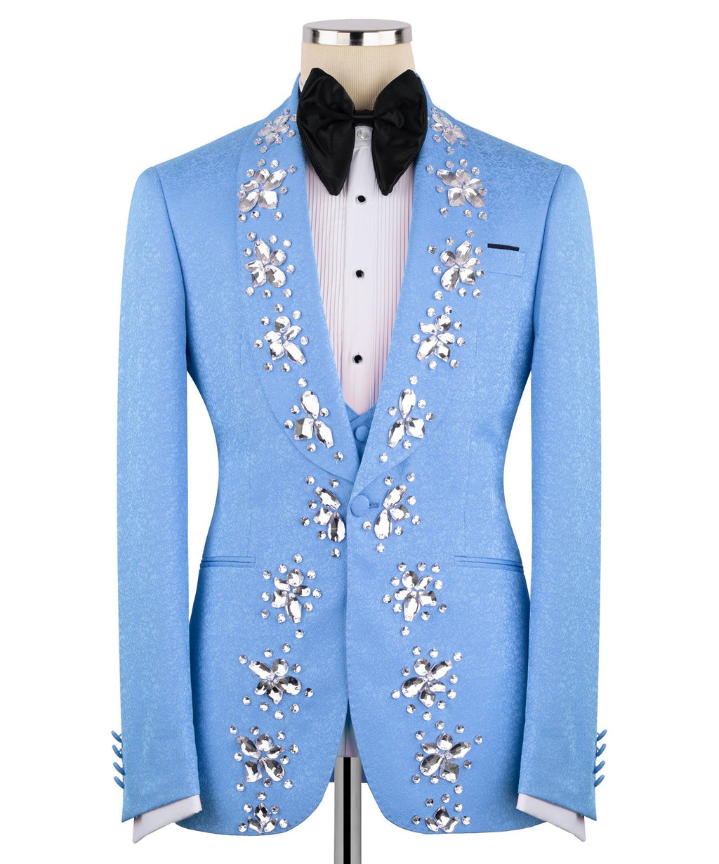 Light blue three-piece tuxedo jacket front with jeweled panels; black bow tie and shirt