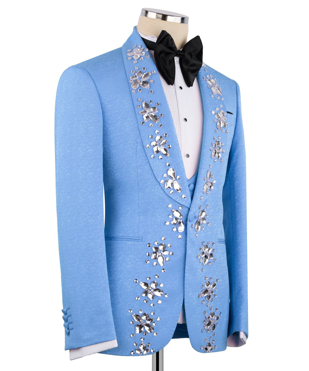 Light blue tuxedo jacket detail with crystal embroidery on lapels; black bow tie