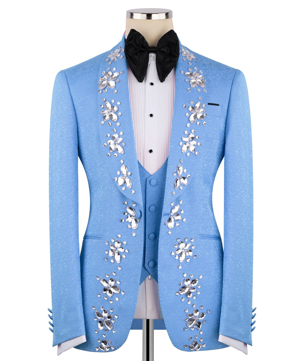 Light blue tuxedo jacket with crystal-flower embroidery and black bow tie; white shirt