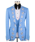Light blue tuxedo jacket with crystal-flower embroidery and black bow tie; white shirt