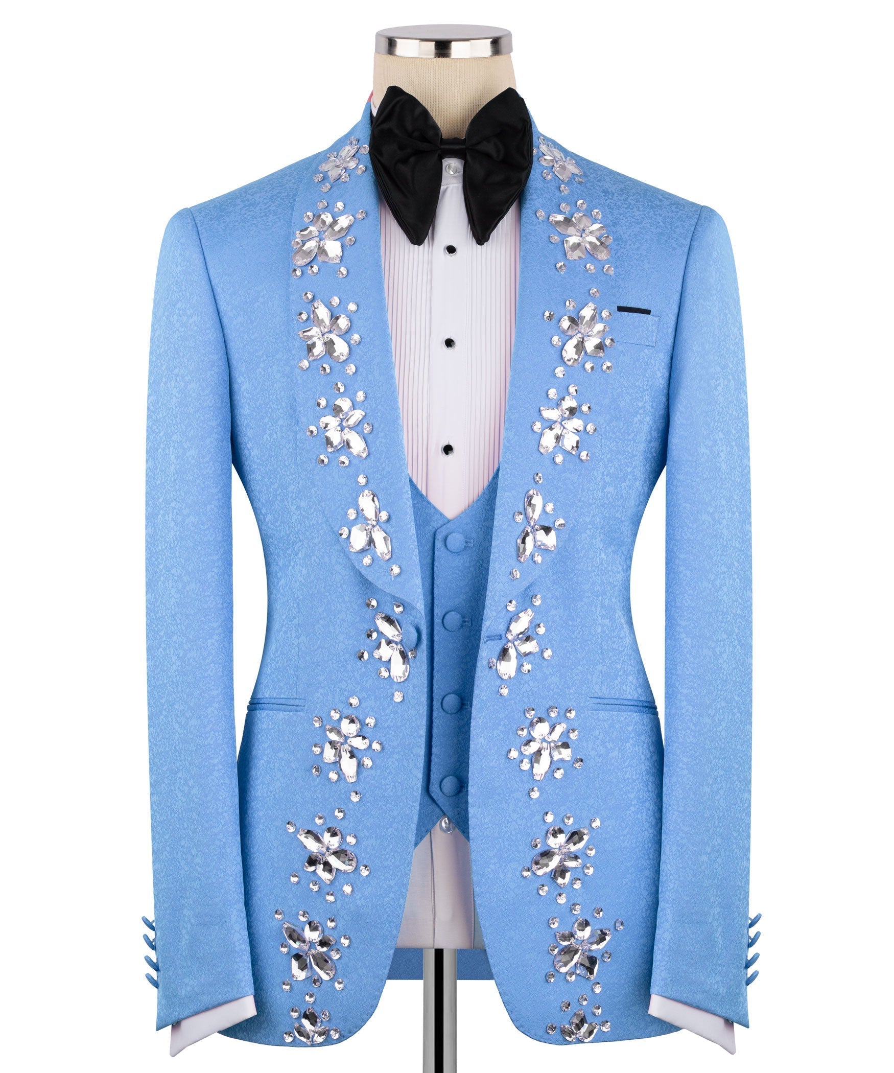 Light blue tuxedo jacket with crystal-flower embroidery and black bow tie; white shirt