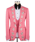 Pink crystal-embroidered tuxedo jacket, black bow tie, white pinstripe vest