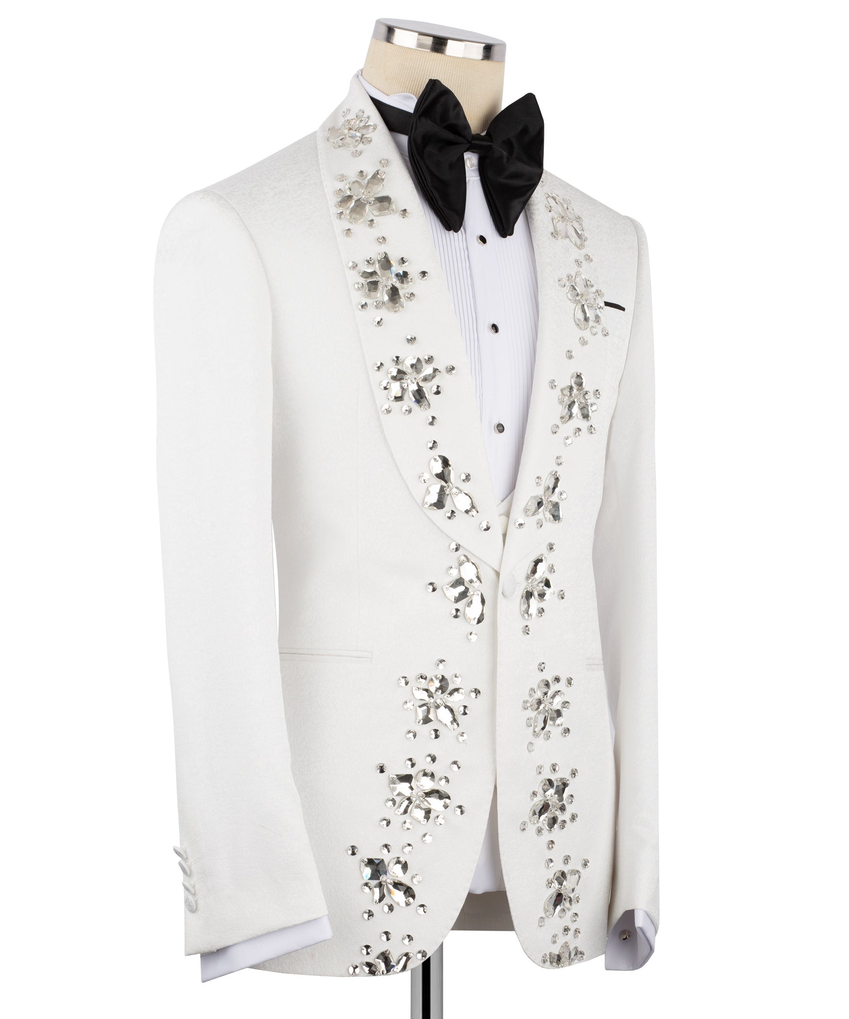White tuxedo jacket with hand-embroidered jeweled panels and black bow tie