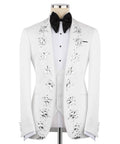 White tuxedo jacket with hand-embroidered rhinestone florals and black bow tie
