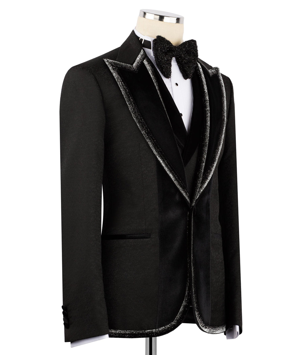 Side view black tuxedo jacket with velvet collar and silver-tone satin edge trim