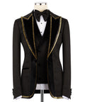 Black tuxedo jacket with embroidered velvet collar, gold trim, and satin lapels