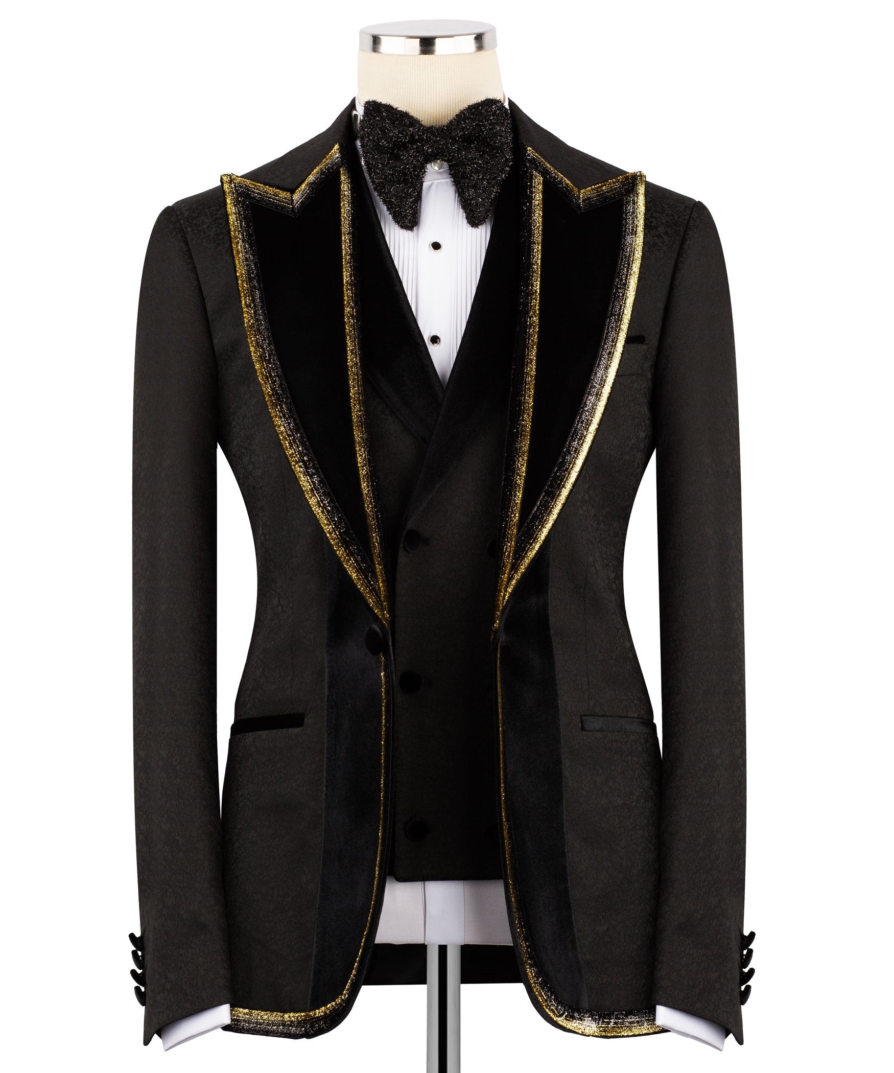 Black tuxedo jacket with embroidered velvet collar, gold trim, and satin lapels