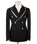 Black double-breasted tuxedo jacket with satin-trim lapels, white shirt, bow tie
