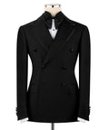Black double-breasted tuxedo jacket with satin lapels and bow tie