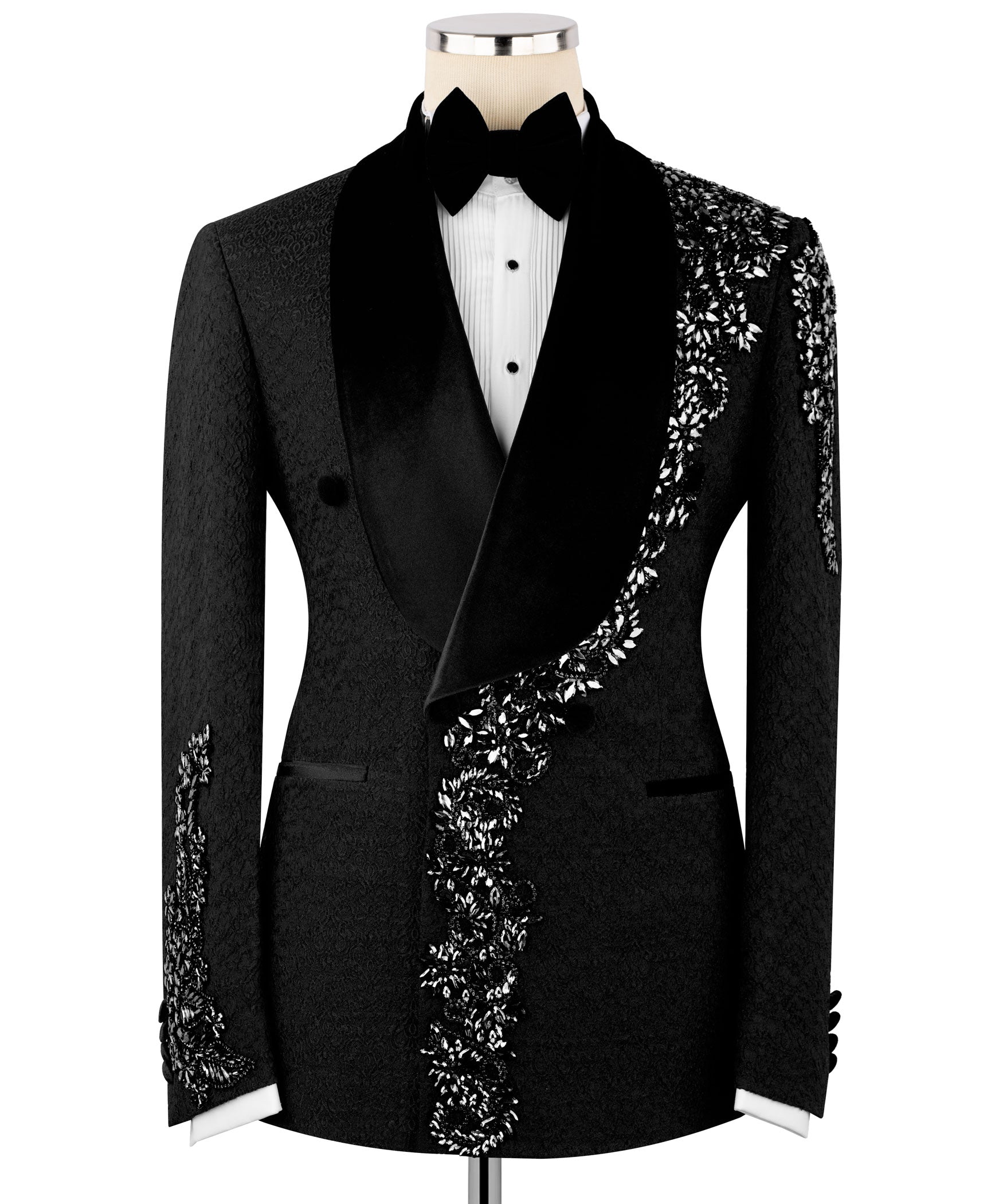 Black tuxedo jacket with velvet collar, bow tie, and silver stone floral embroidery